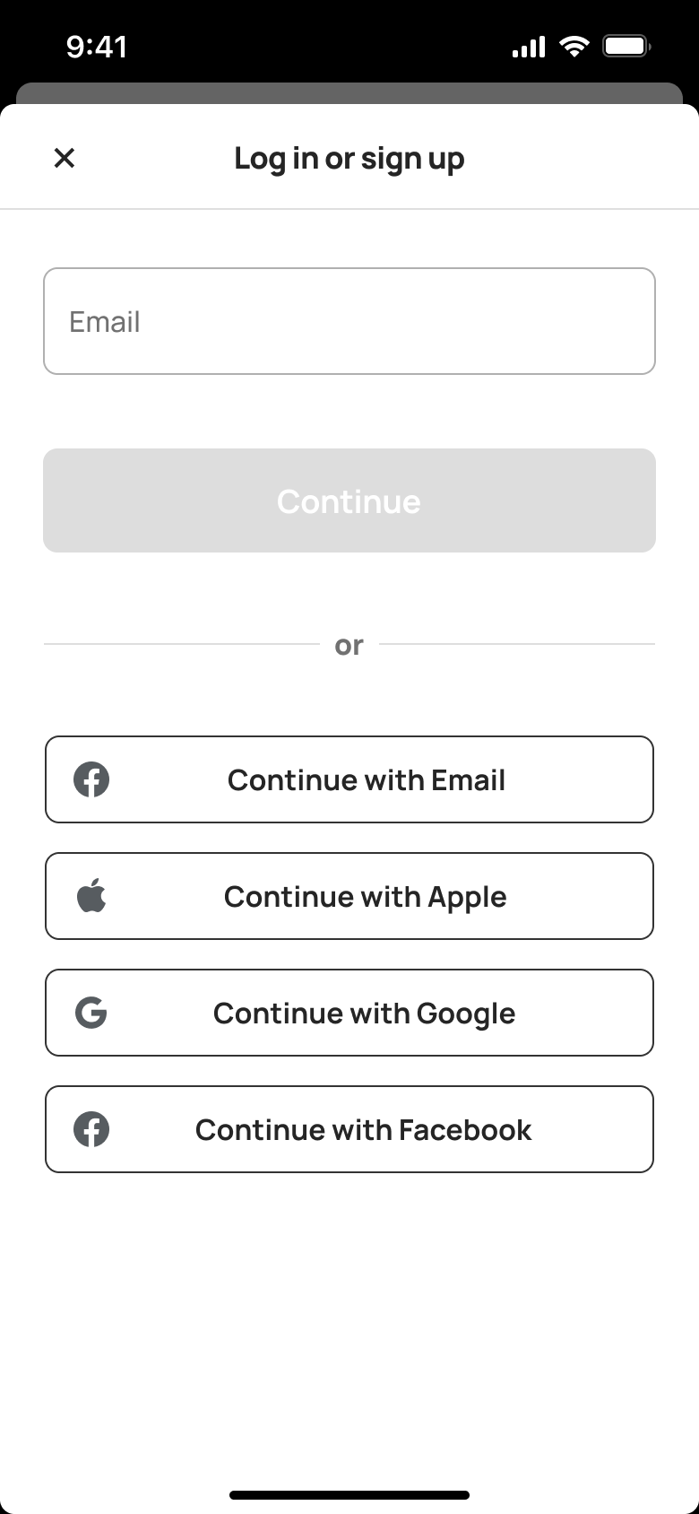 Log in or sign up with email field and social options.