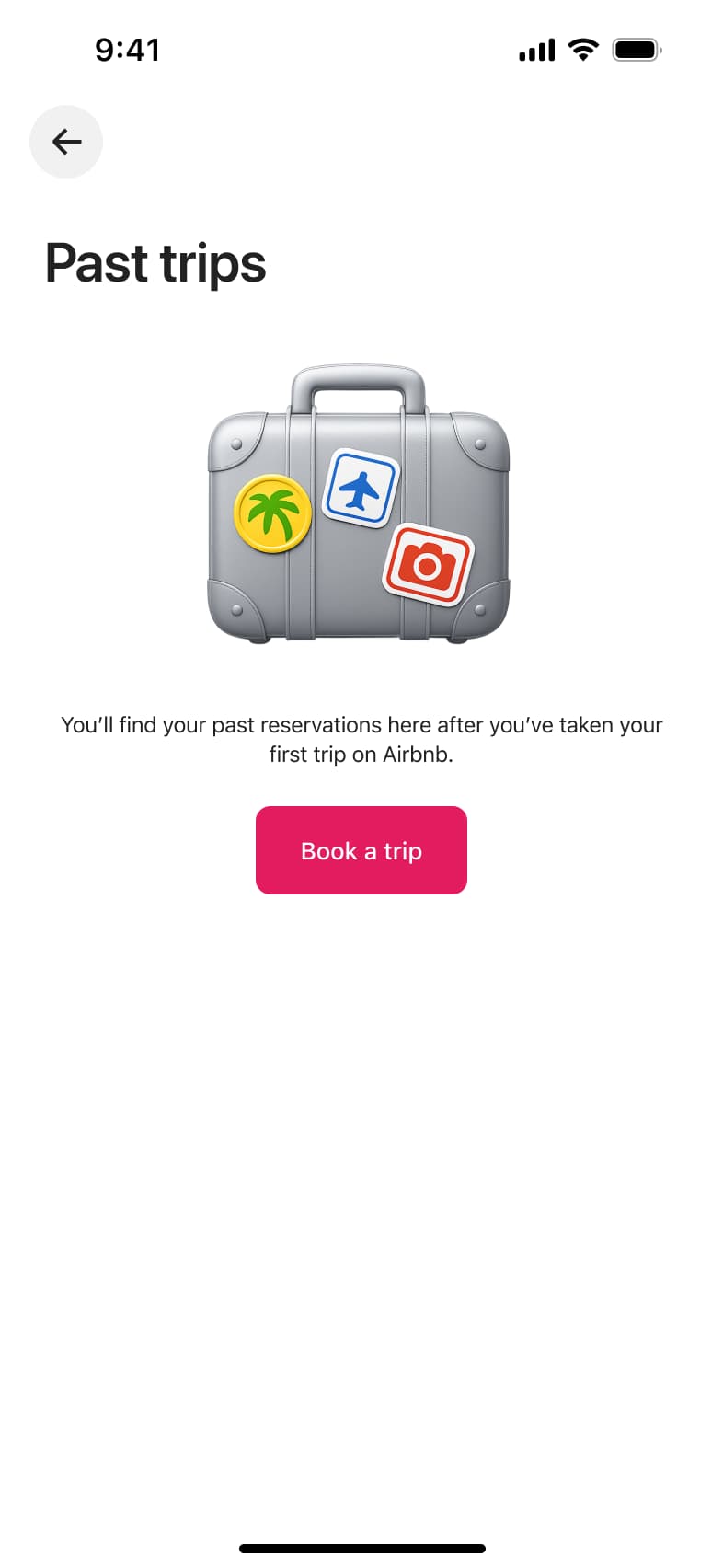 Past trips empty state with suitcase illustration and book a trip button.