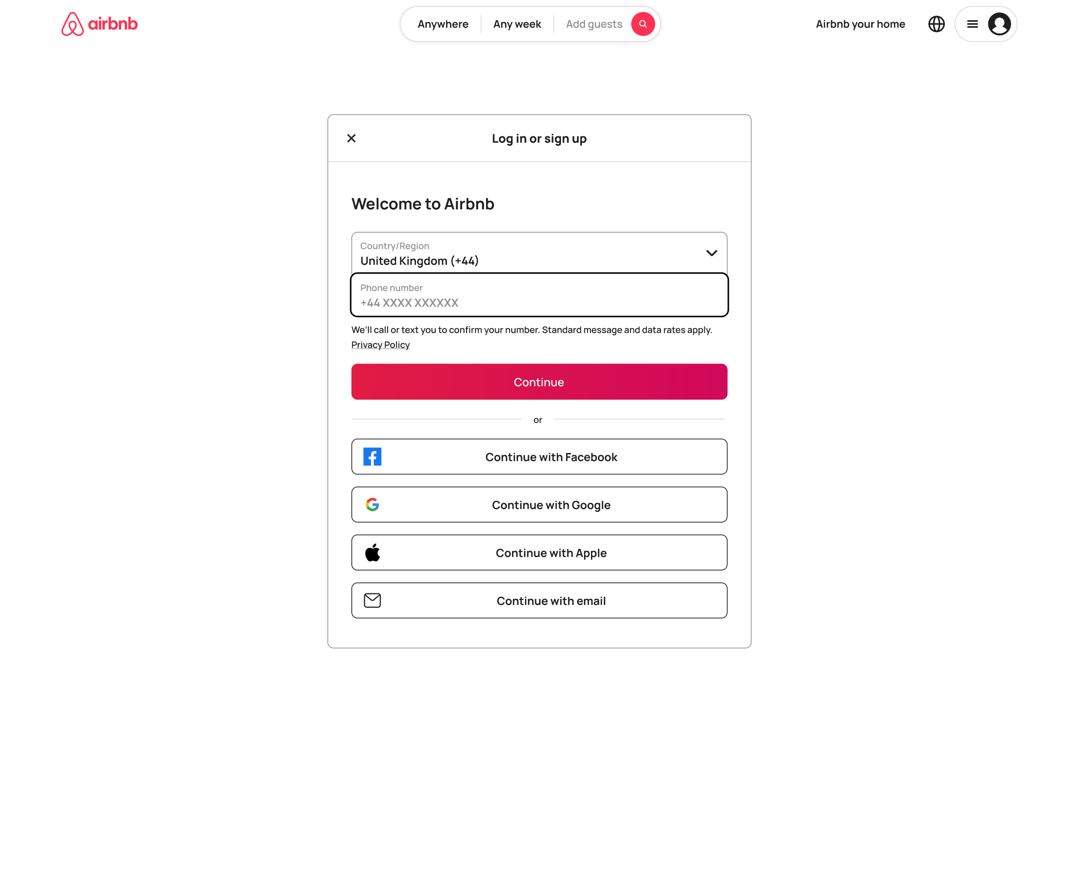 Desktop log in: phone field focused with format hint.
