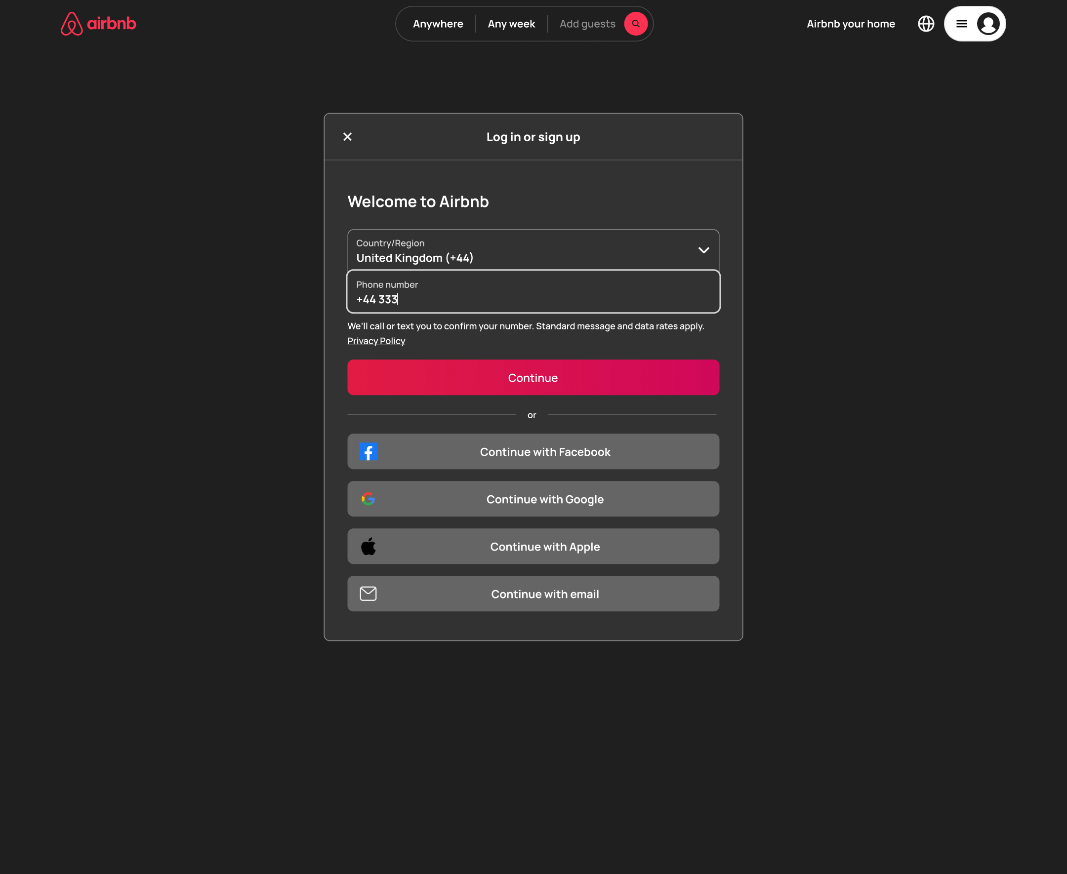 Dark mode: desktop log in: phone number being typed.