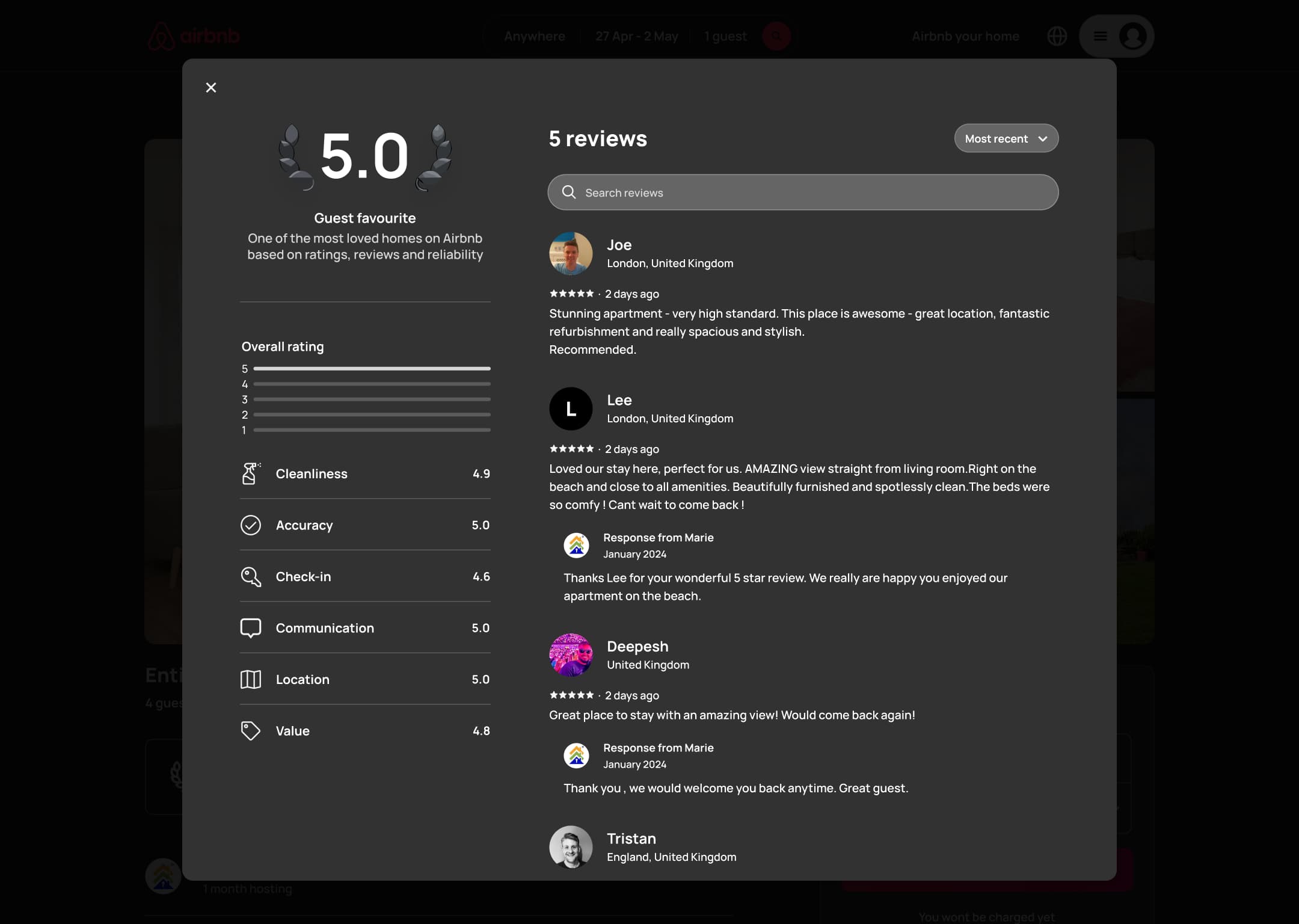 Dark mode: desktop reviews modal: rating breakdown, search, sort and reviews with host responses.