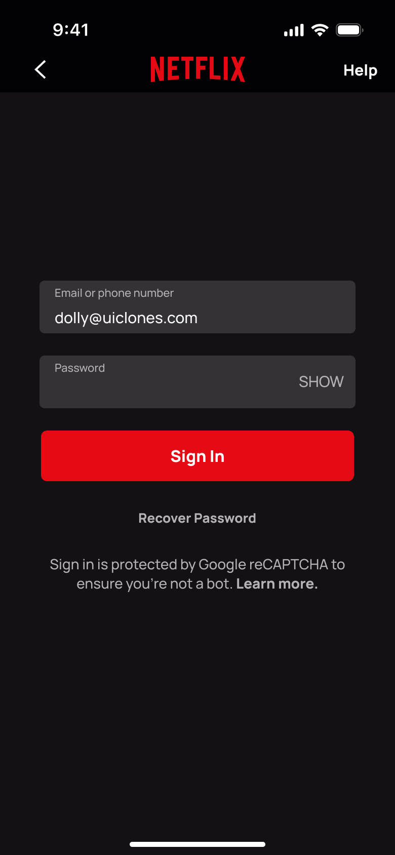Email and password entered, red Sign In button enabled.