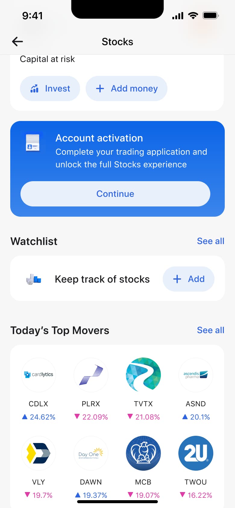 Stocks home scrolled through watchlist and top movers grid.