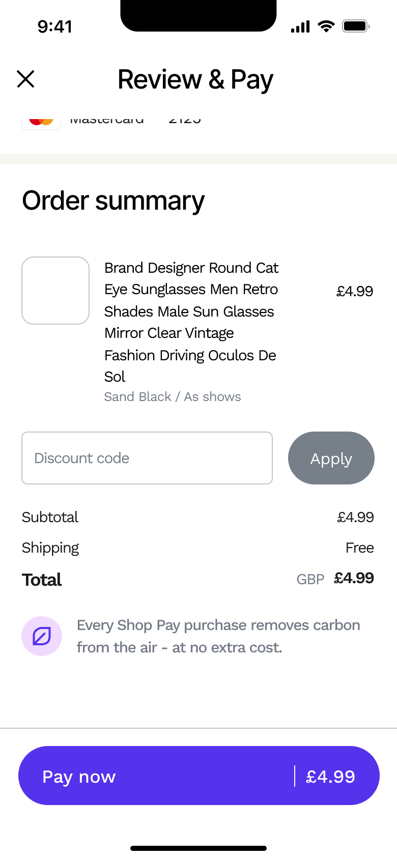 Order summary: item, discount code, totals and carbon note with pay now.