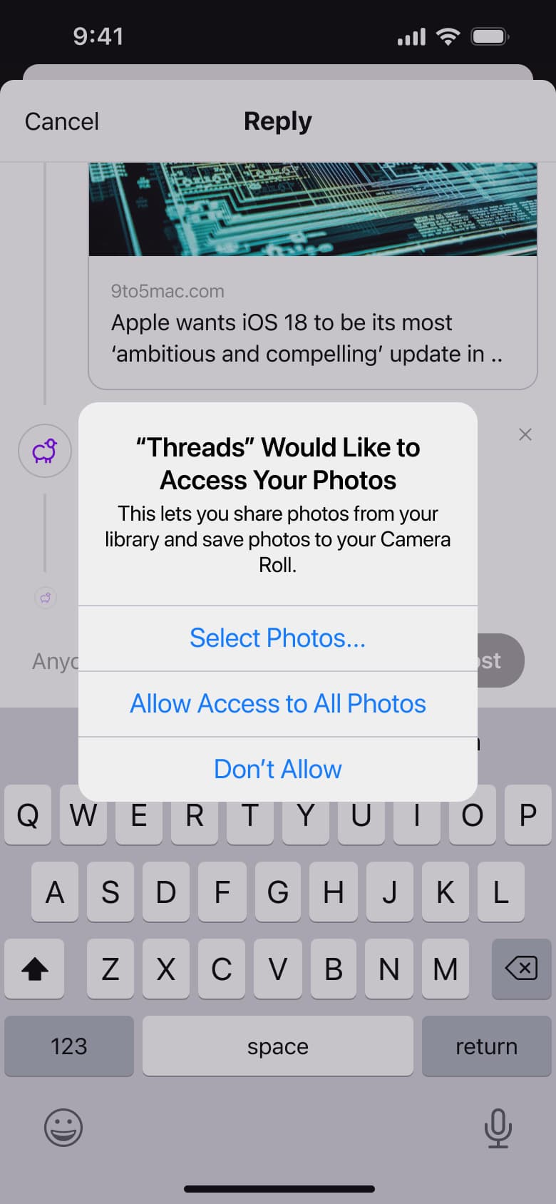 Photo library access alert over reply composer.