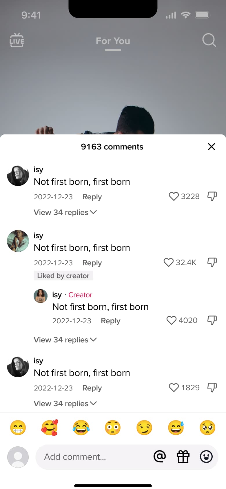 Comments sheet over a video with likes, replies and emoji quick reactions.