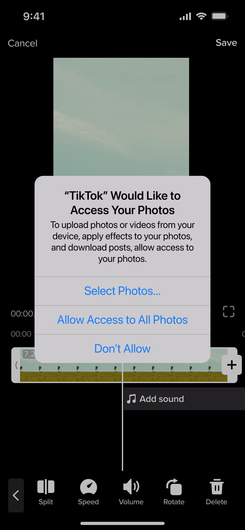 Photo library access system alert over the video editor.