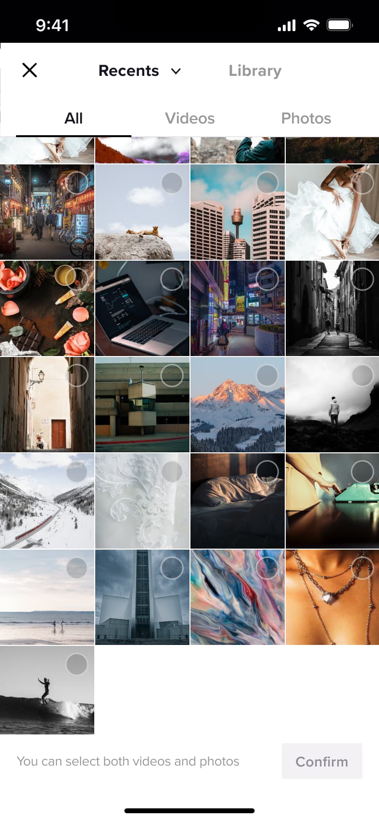 Media picker: recents grid with all, videos and photos tabs.