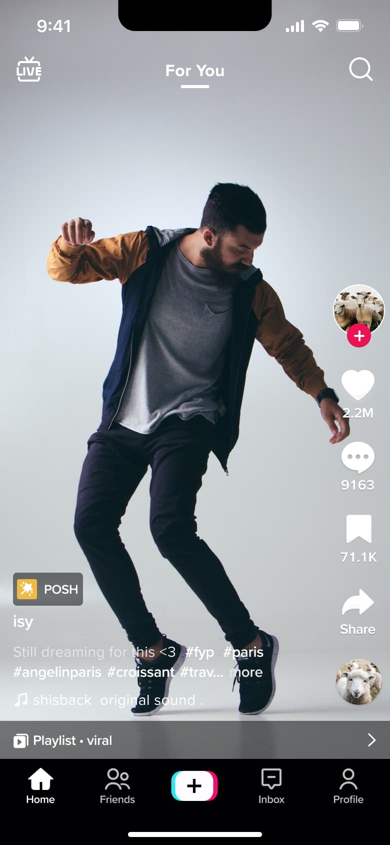 For you feed video with action rail, repost and product chips, caption and playlist bar.