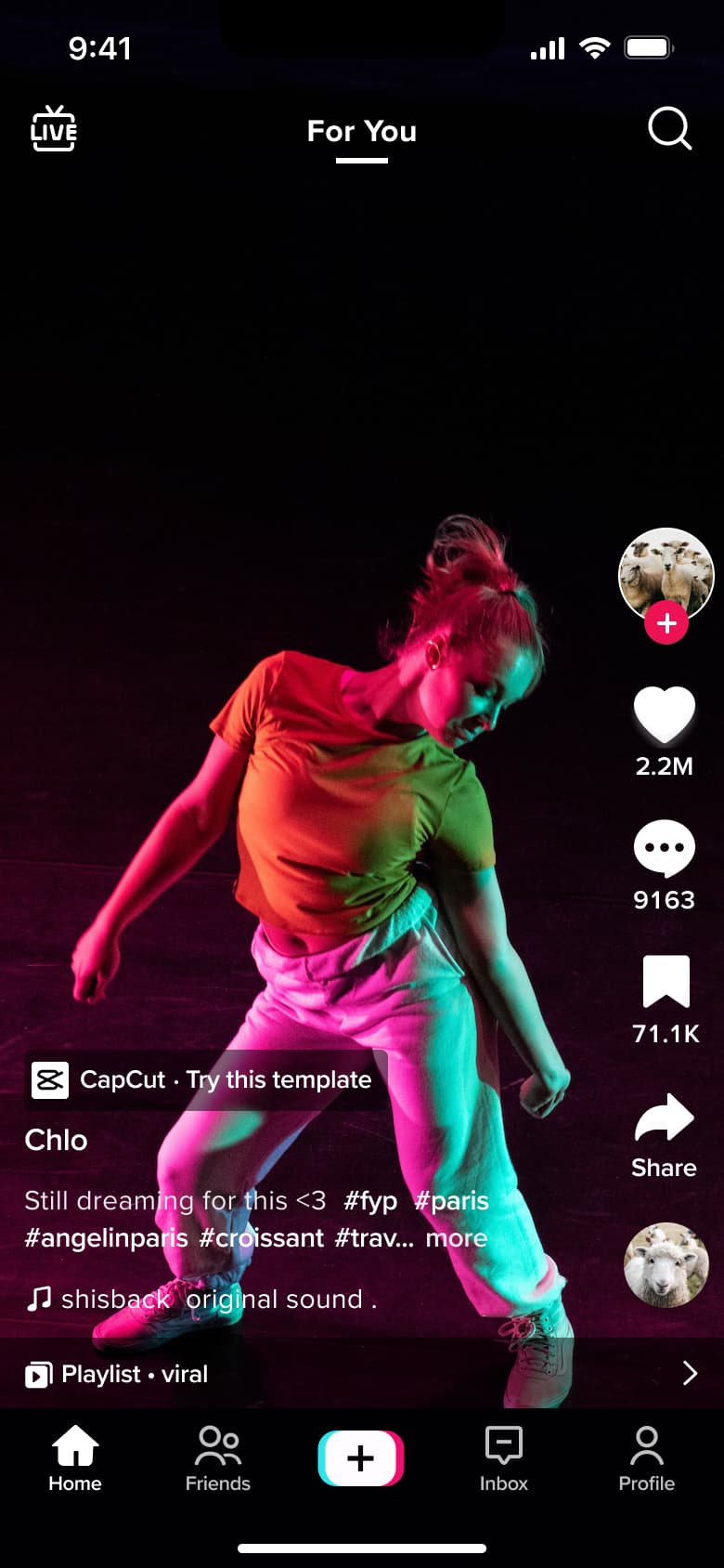 Feed dance video with template chip and playlist bar.