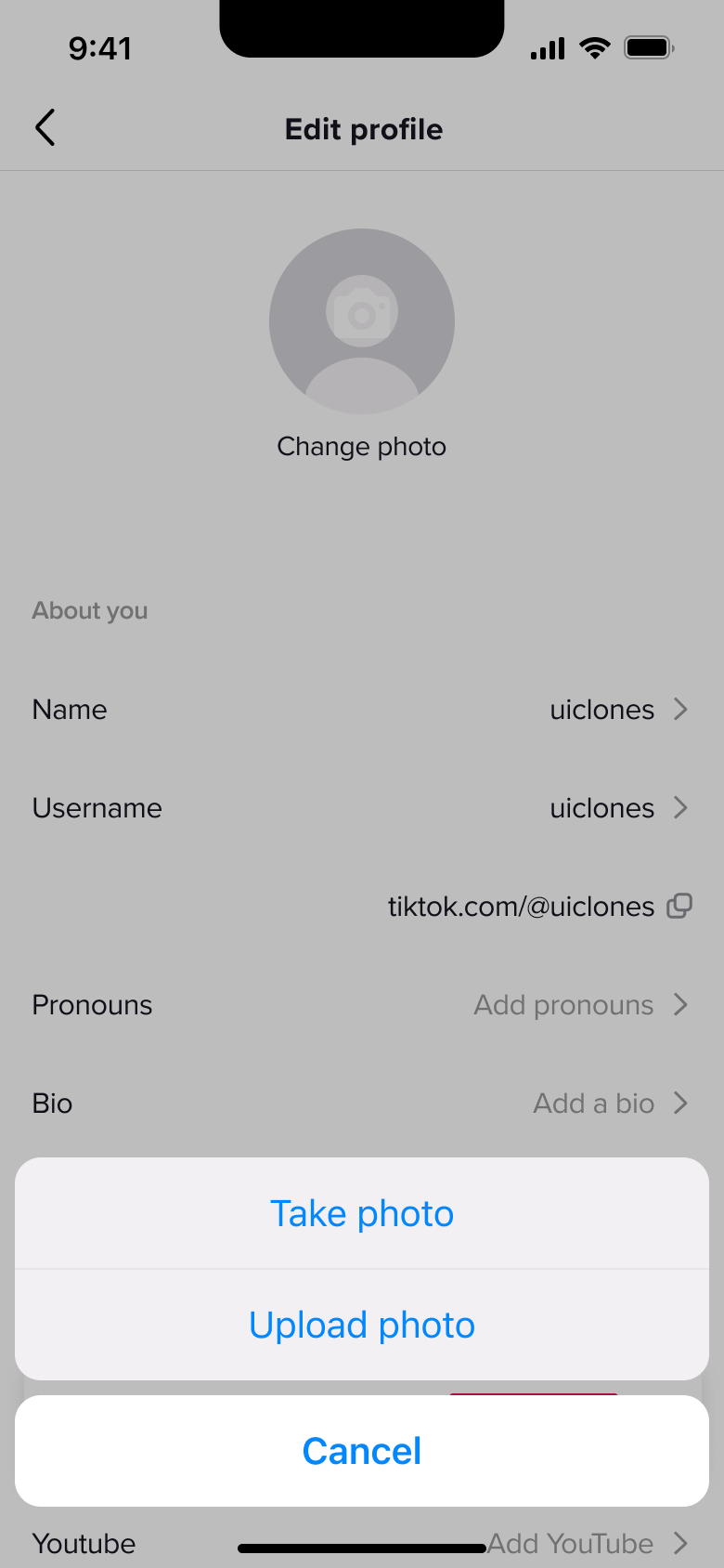 Change photo action sheet: take photo or upload photo.