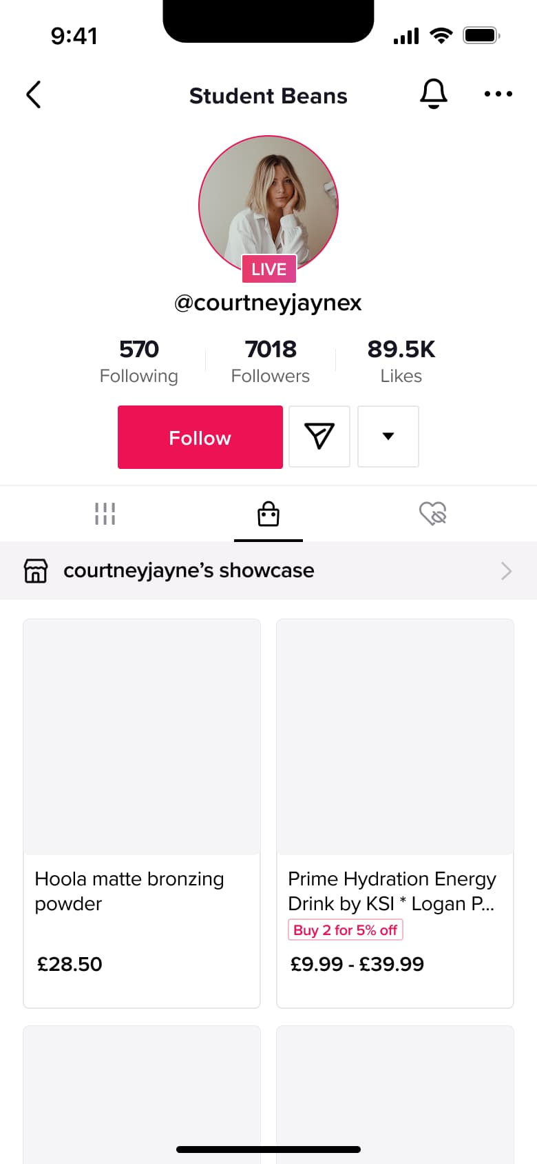 Live creator profile with shop showcase tab and product cards.