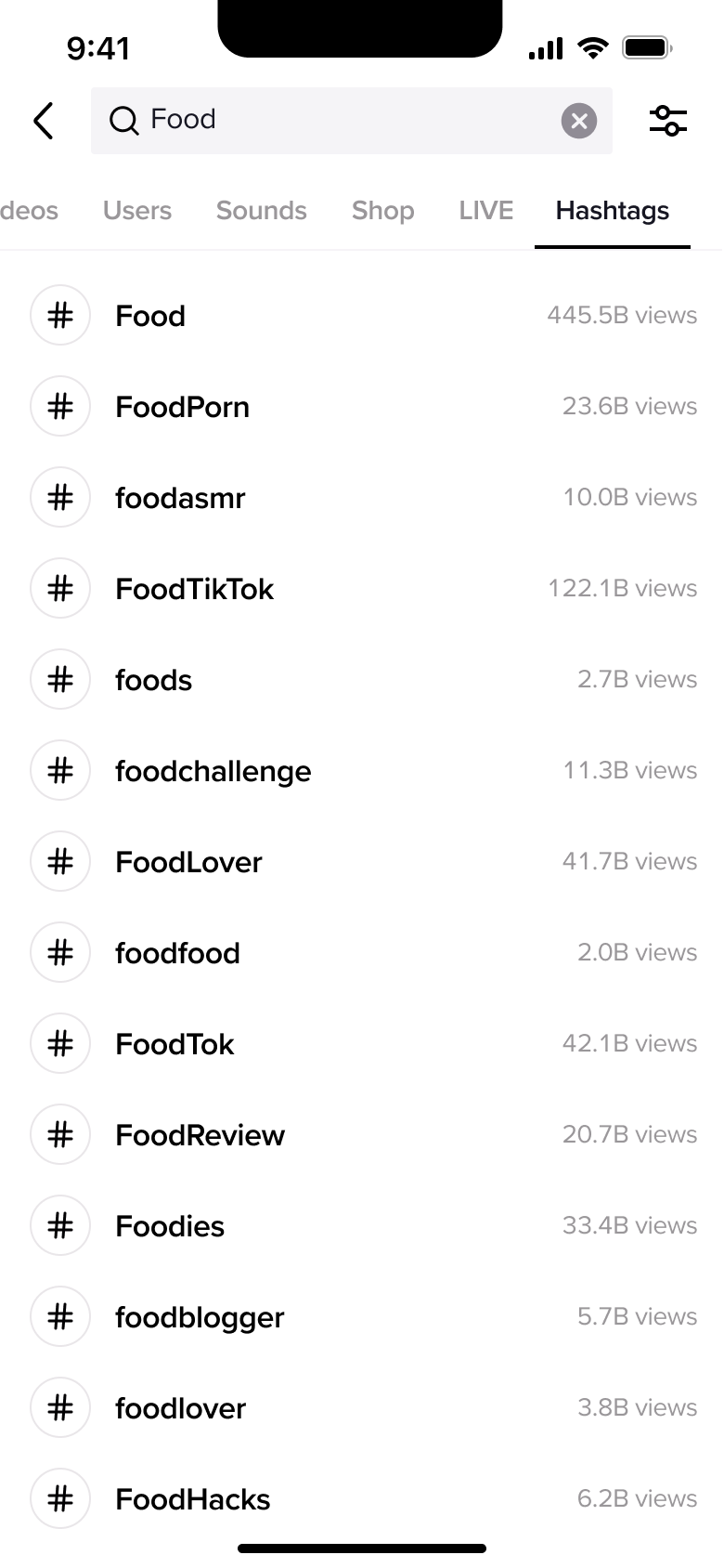Hashtag search results with view counts.