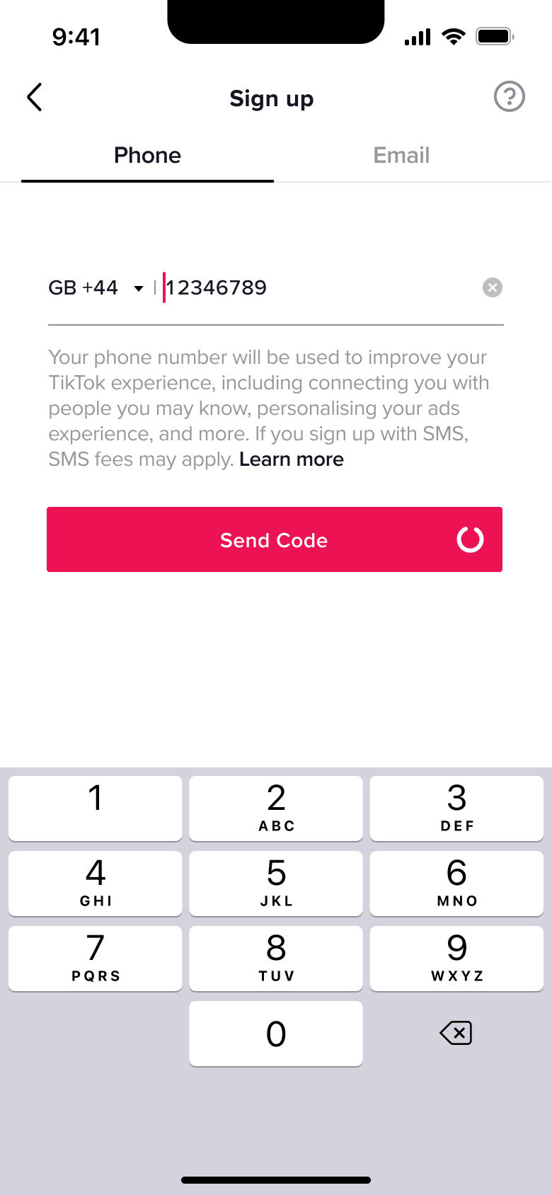 Phone sign up sending code, cursor in field.