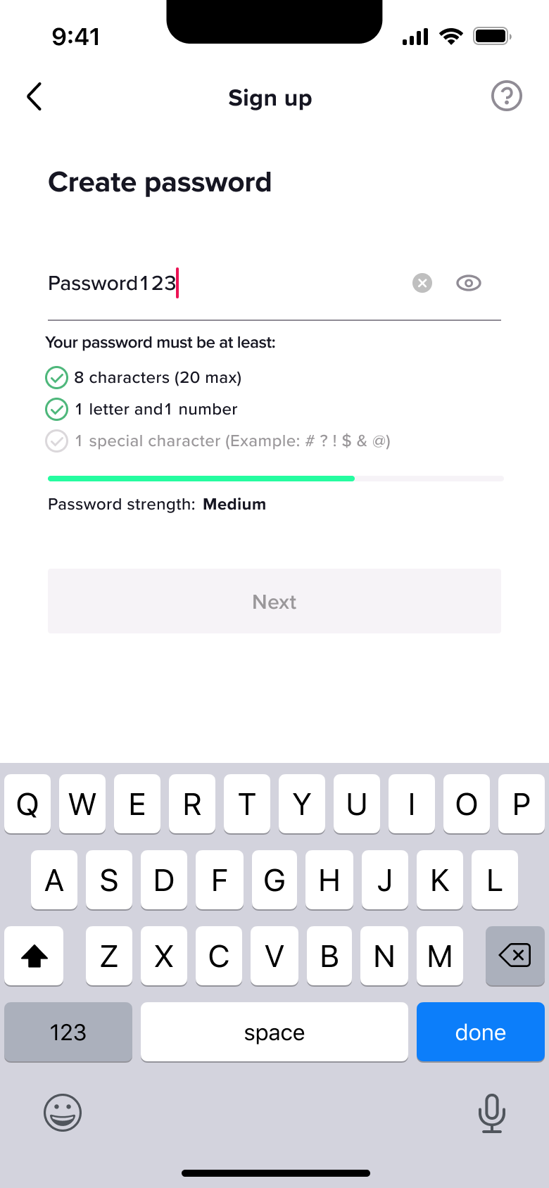 Visible password typed with keyboard, strength medium.