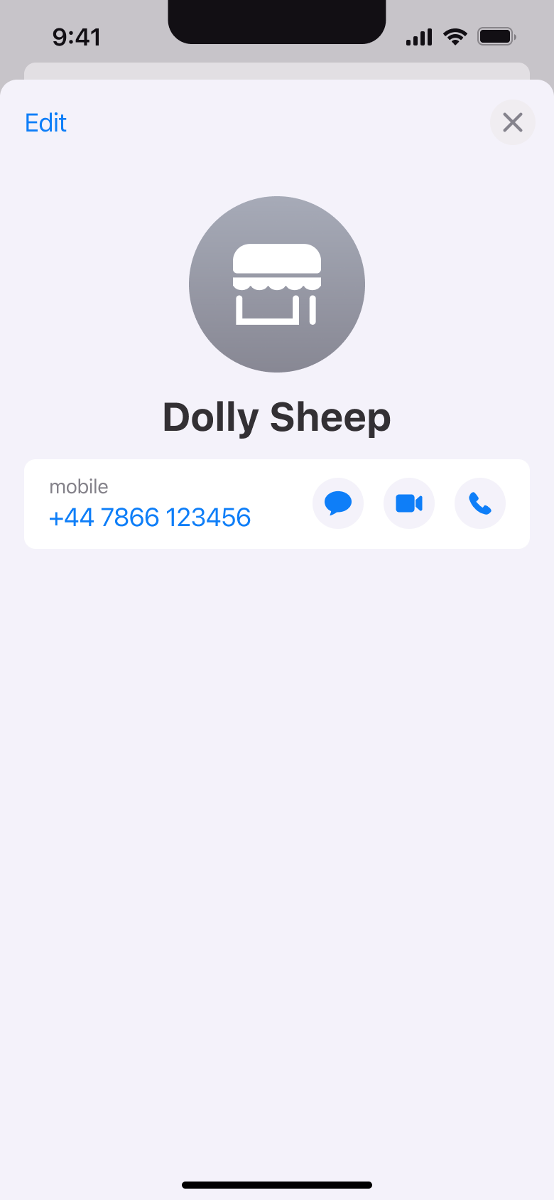 Contact card: number with message, video and voice call buttons.